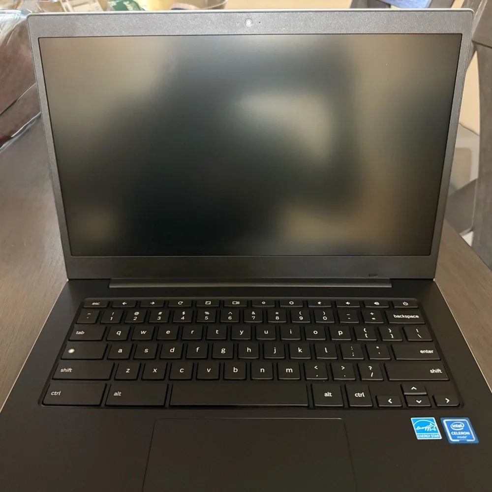 Sleek Black Laptop with Blue Display